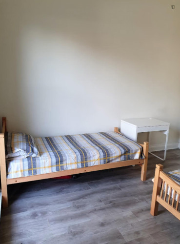 Bed in a homely twin bedroom, in Broadstone