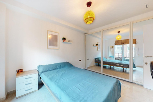 Cozy single bedroom with balcony