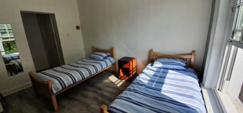 Bed in a homely twin bedroom, in Broadstone