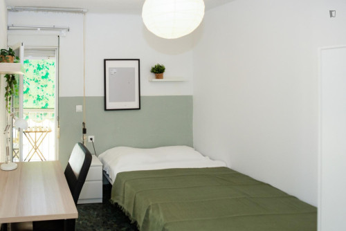 Cozy single bedroom with balcony