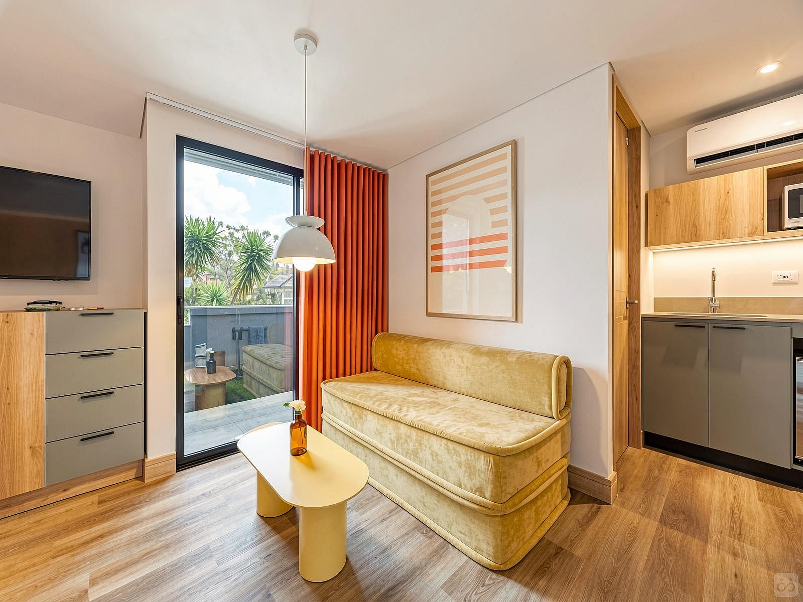 Studio Apartment W/ Kitchen & 2 Balconies - 89