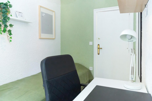 Cozy single bedroom with balcony