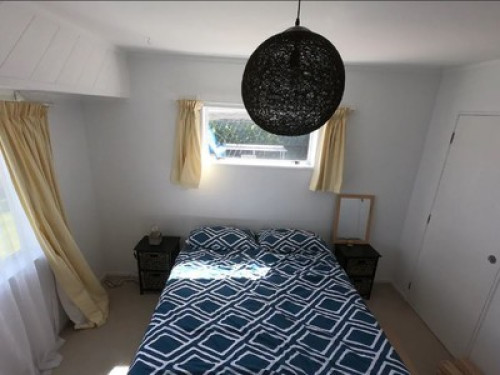 Lovely bedroom with shared bathroom