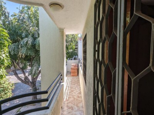 Room with central balcony