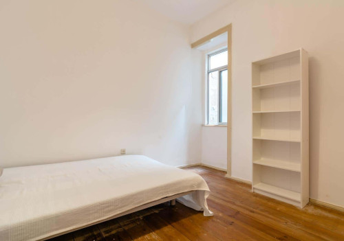 Quarto com cama de solteiro em apartamento com 9 quartos - FLAT N - N4