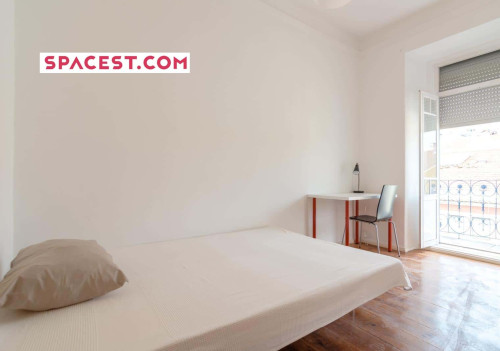 Quarto com cama de casal em apartamento com 9 quartos - FLAT N - N1