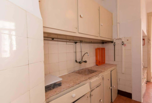 Quarto com cama de solteiro em apartamento com 8 quartos - FLAT E - SALDANHA 57E