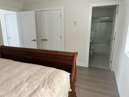 A large bright modern bedroom