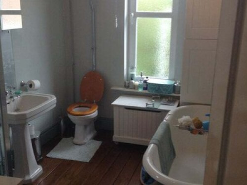 Airy attic room with posh bathroom