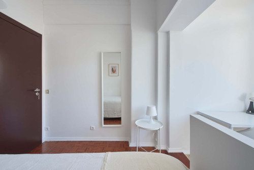 Comfortable bedroom in a 5-bedroom apartment in Rua Eugénio de Castro - Room 1