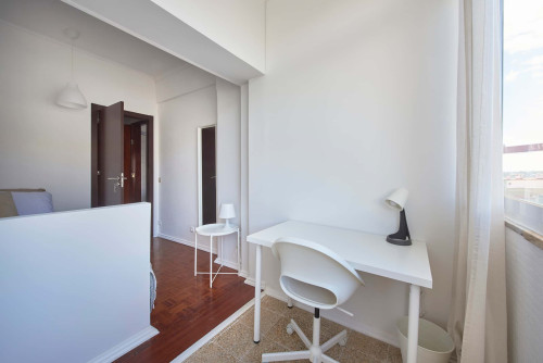 Comfortable bedroom in a 5-bedroom apartment in Rua Eugénio de Castro - Room 1