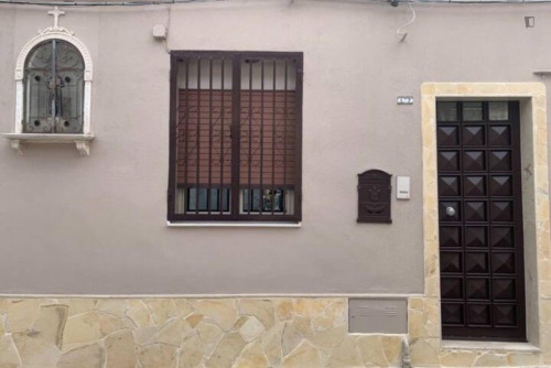 Double bedroom on the ground floor with external private bathroom, shared living &kitchen