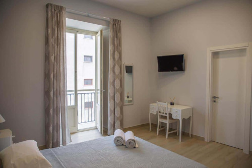 Stanza con bagno privato Via Sacra 11