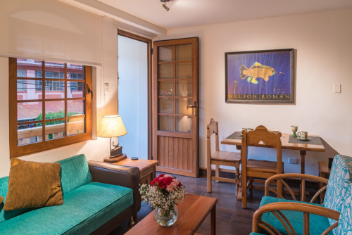 Cozy house with balcony in Baños de Agua Santa downtown