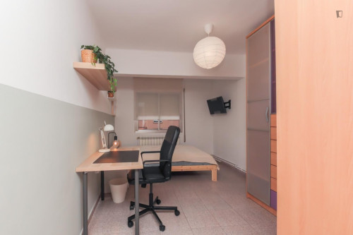 Cozy single bedroom in a property with balcony