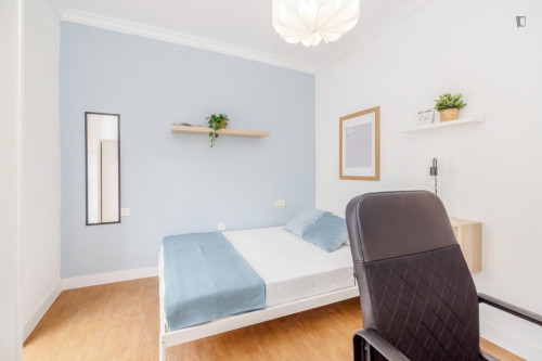 Cozy single bedroom with balcony