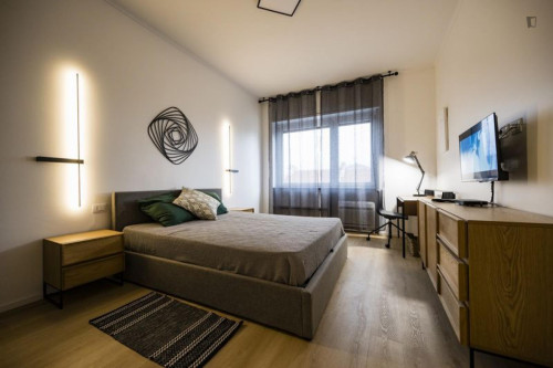 Modern bedroom in a 2 bedroom flat with 2 bathrooms