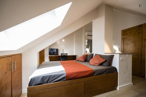 Cozy bedroom in a modern 3-bedroom apartment