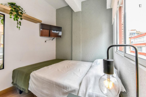 Cozy single bedroom in a property with balcony