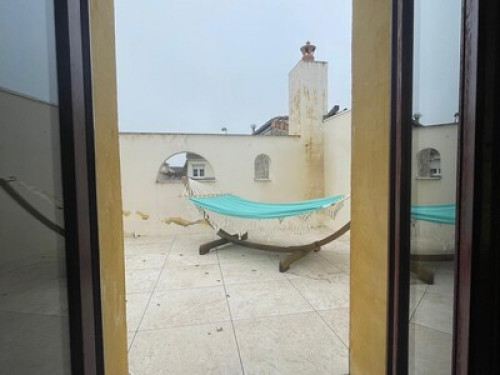 Room with sunny terrace