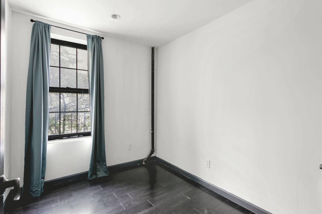 #561: East Village - Full Bedroom A - 1
