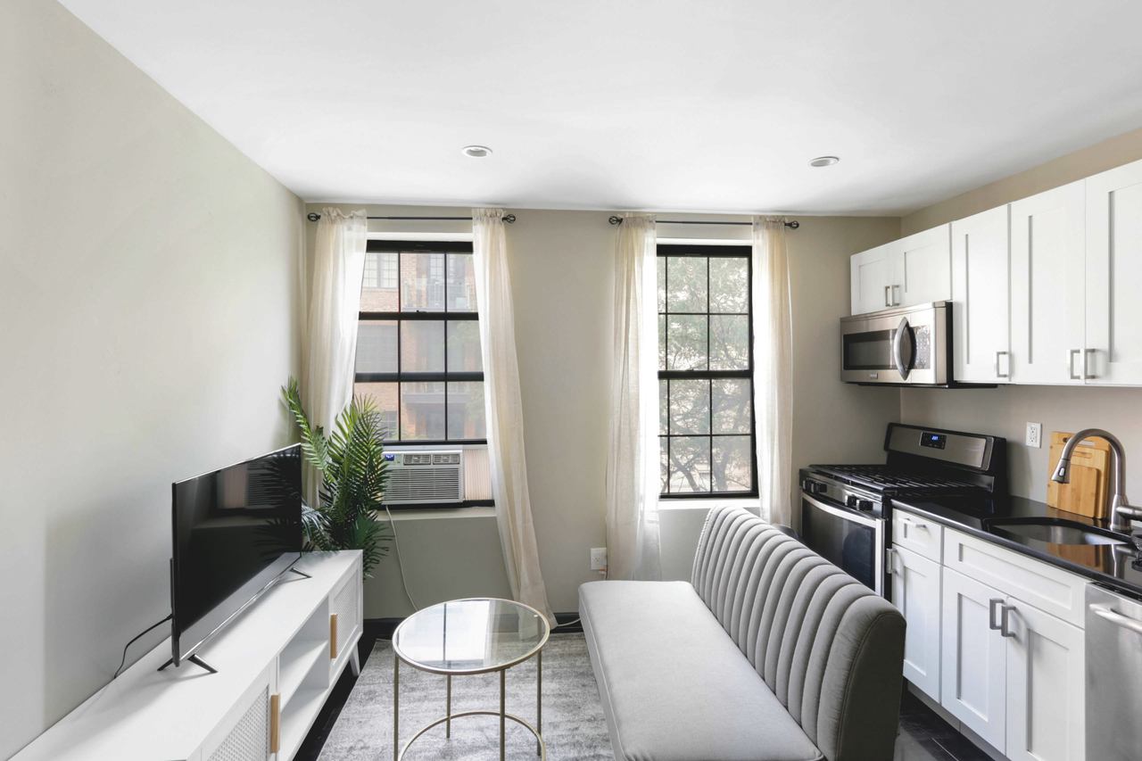 #561: East Village - Full Bedroom A - 8