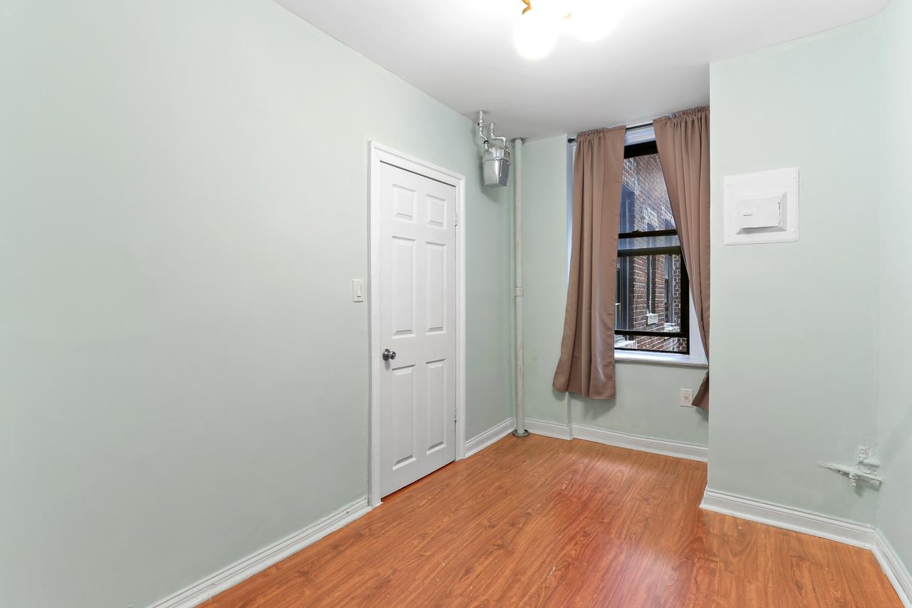#702: East Harlem - Full Bedroom B - 12