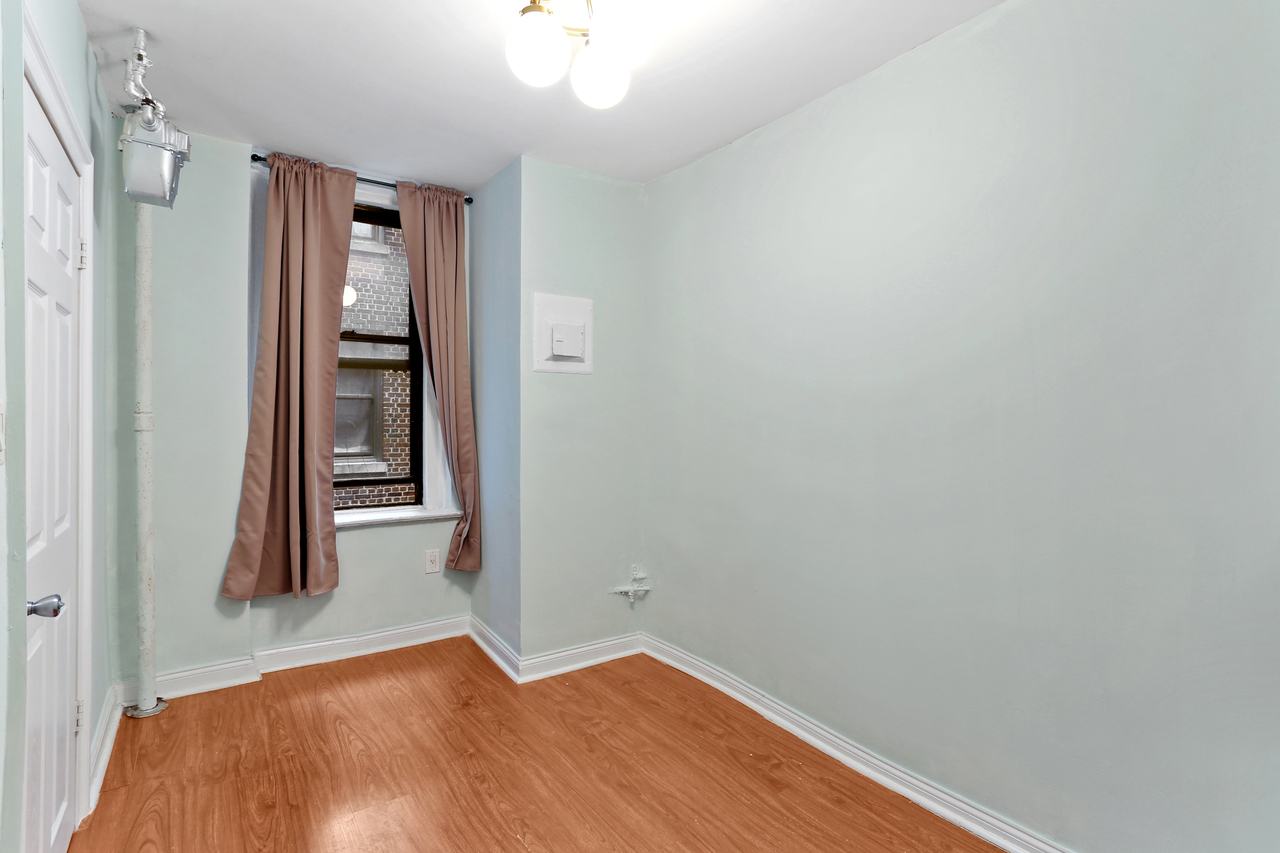 #702: East Harlem - Full Bedroom B - 13