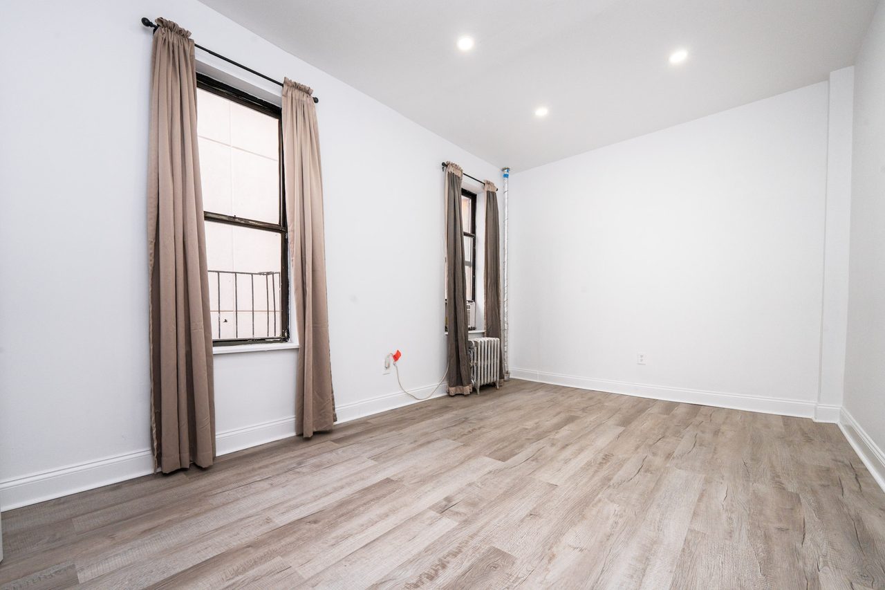 #703: East Harlem - Queen Bedroom B - 13