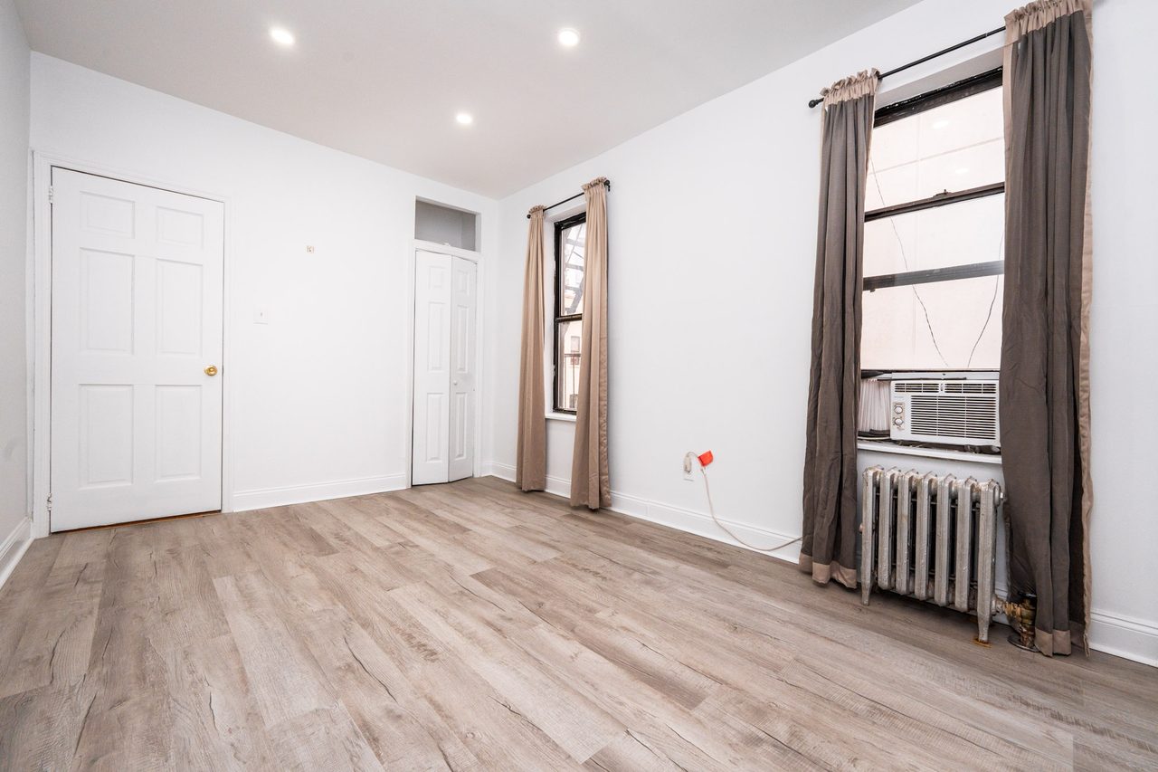 #703: East Harlem - Queen Bedroom B - 12