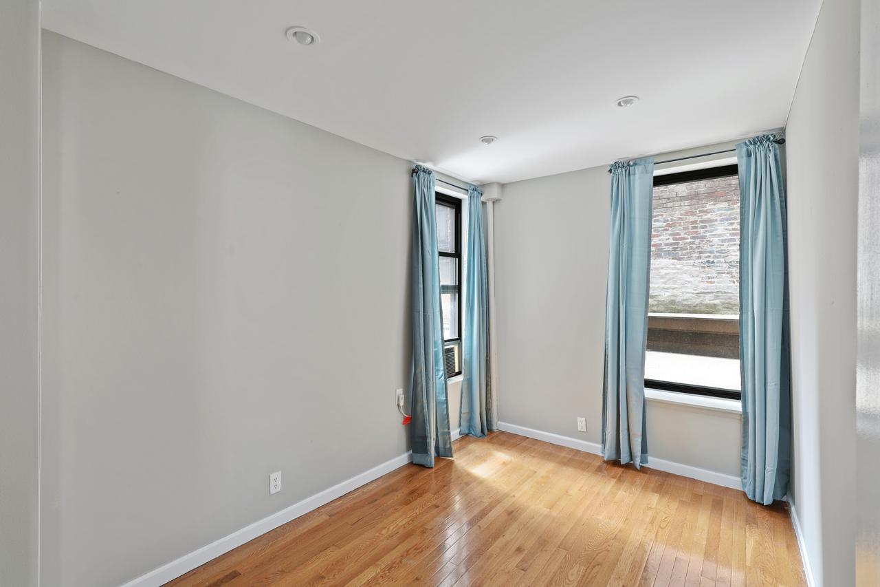 #560: East Village - Full Bedroom B - 3