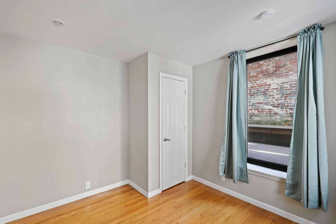 #560: East Village - Queen Bedroom C - 8