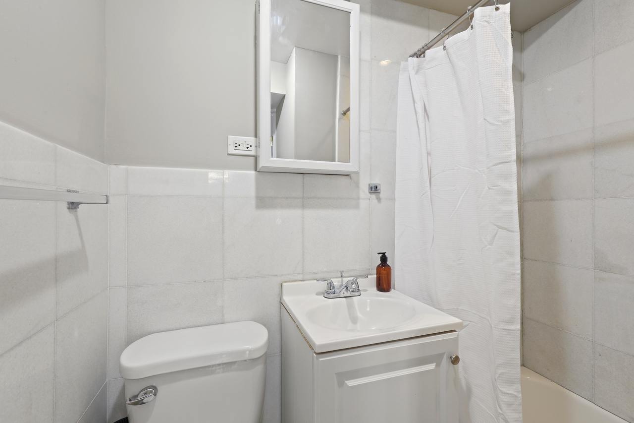 #560: East Village - Full Bedroom A - 19
