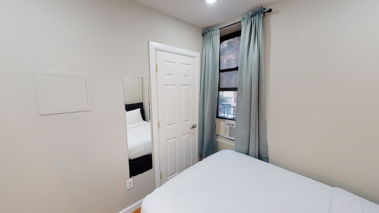 #560: East Village - Full Bedroom A - 8