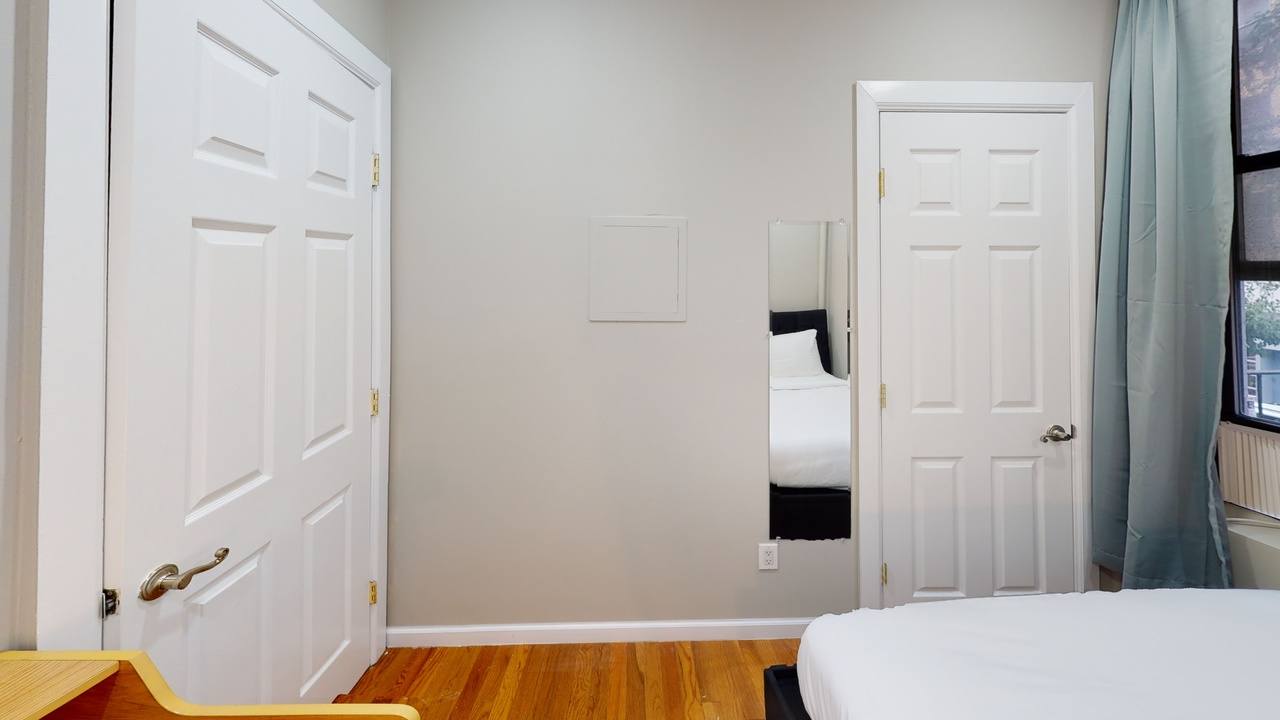 #560: East Village - Full Bedroom A - 1