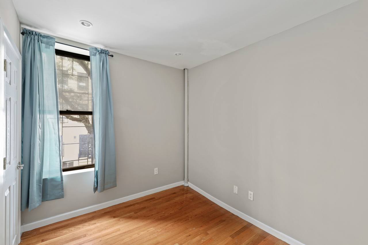 #560: East Village - Full Bedroom A - 2
