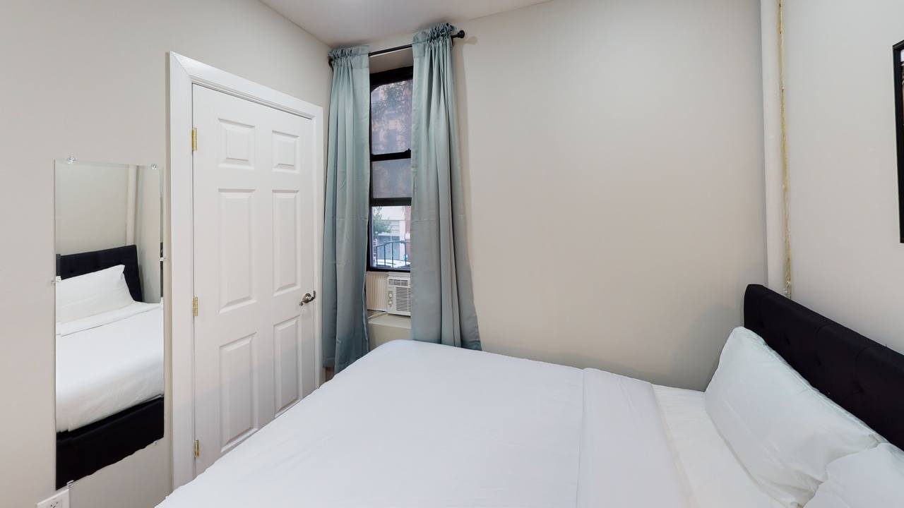 #560: East Village - Full Bedroom A - 10