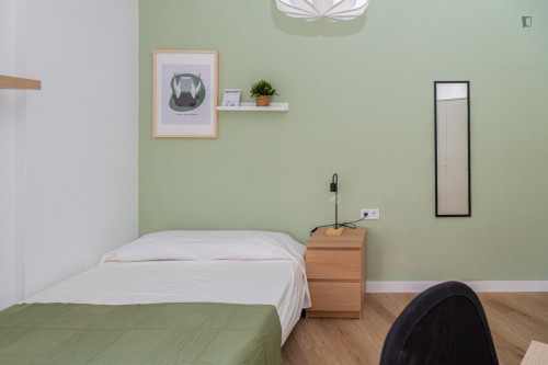 Cozy single bedroom in a property with balcony