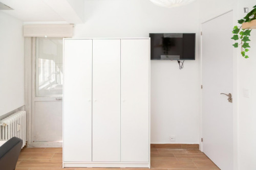 Cozy single bedroom with balcony