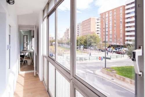 Cozy single bedroom with balcony