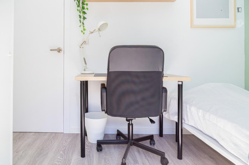 Cozy single bedroom with balcony