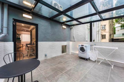 Mid-Century Modern Coliving Oasis in Historic Tai Ping Shan Apartment