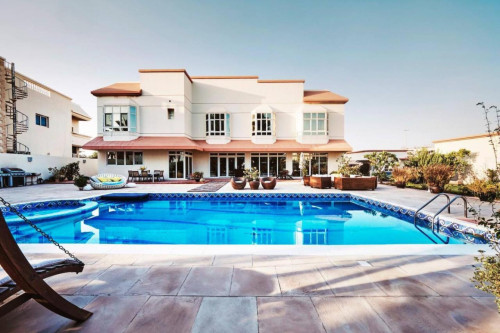 Elegant 19,000 Sq. Ft. Retreat: Luxurious Living with Private Garden, Pool, and Dual Kitchens