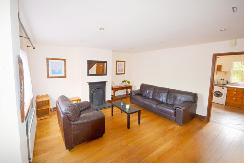 Bed in a comfy twin female bedroom