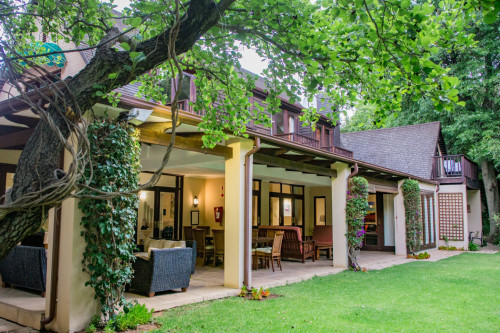 A breezy villa residence with luscious gardens and sunny open space
