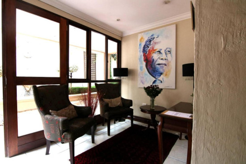 A breezy villa residence with luscious gardens and sunny open space