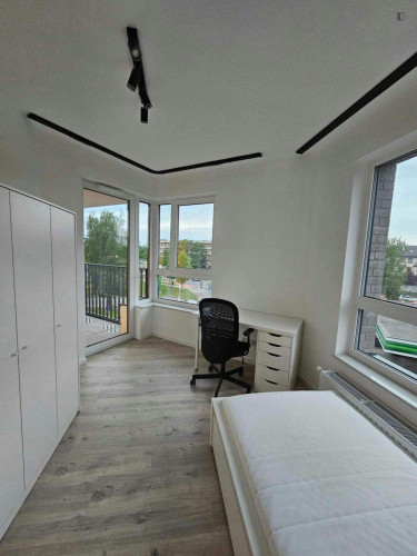 Airy single bedroom with a balcomny, in Warszawskie