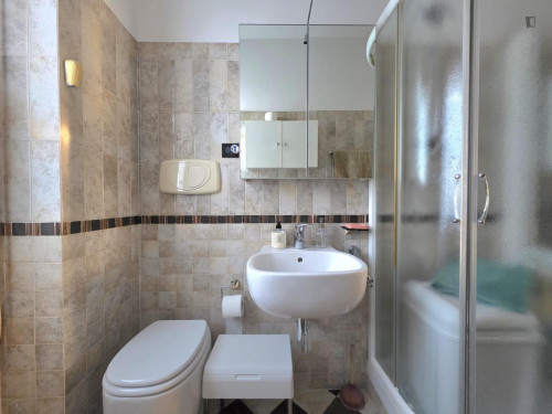 Bed in a comfy twin bedroom, near the Bivio S.Vitale train station