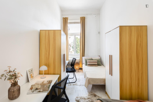 Bed in an interesting twin bedroom, near the Budapest-Keleti train station