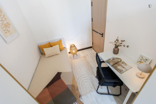 Bed in an interesting twin bedroom, near the Budapest-Keleti train station